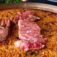 paella chuleton madurado con cocktel de setas